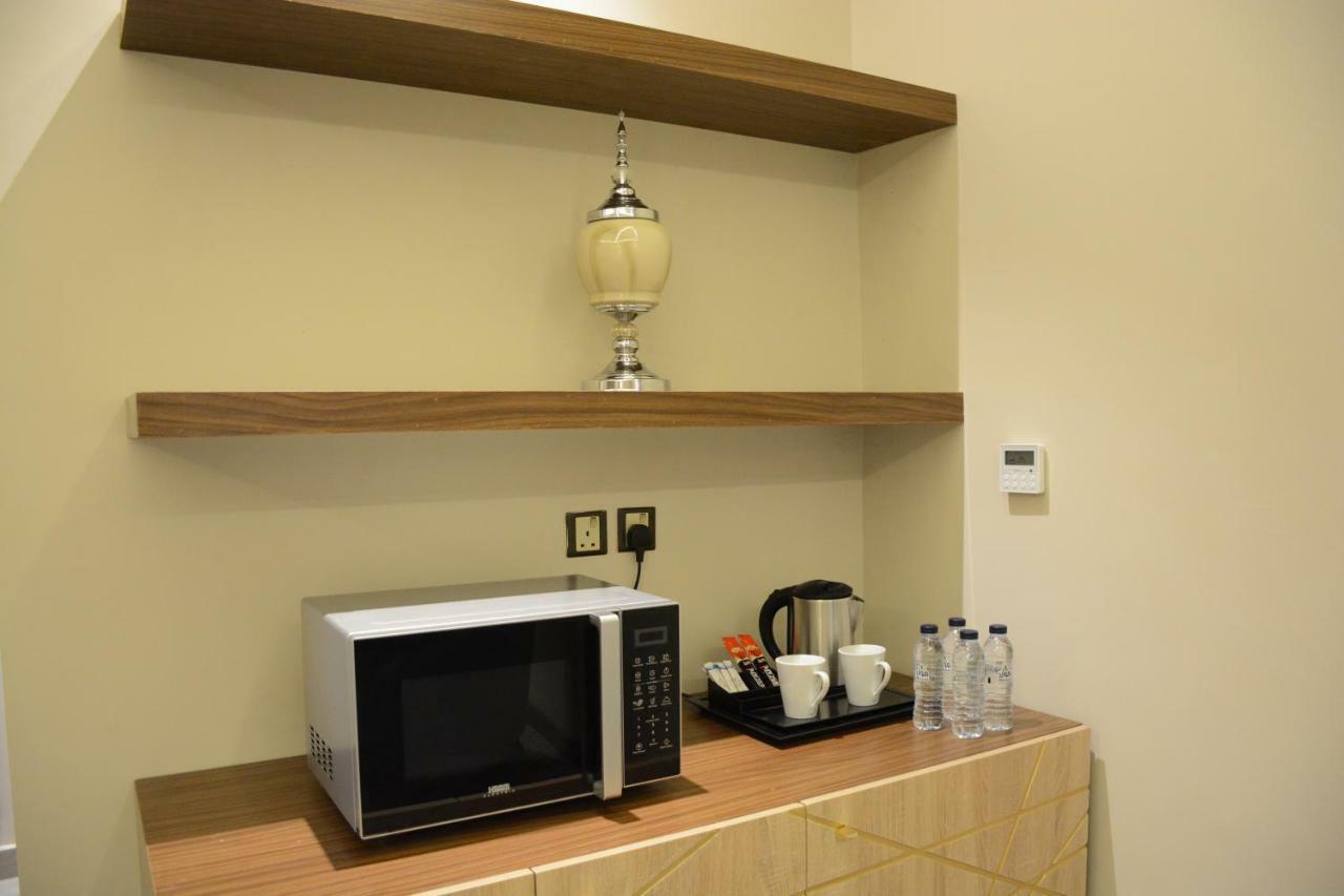 الايوان للاجنحة الفندقية E1 Hotel Al Kharj Ngoại thất bức ảnh